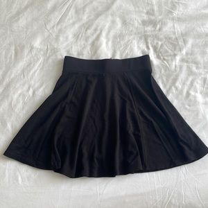 Black exposed zipper skater skirt